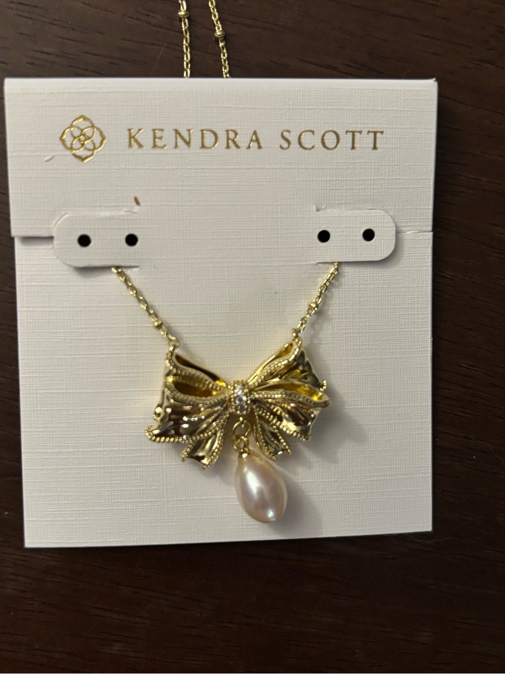 Brand new Kendra Scott Gold plated Bow Necklace with Pearl Drop